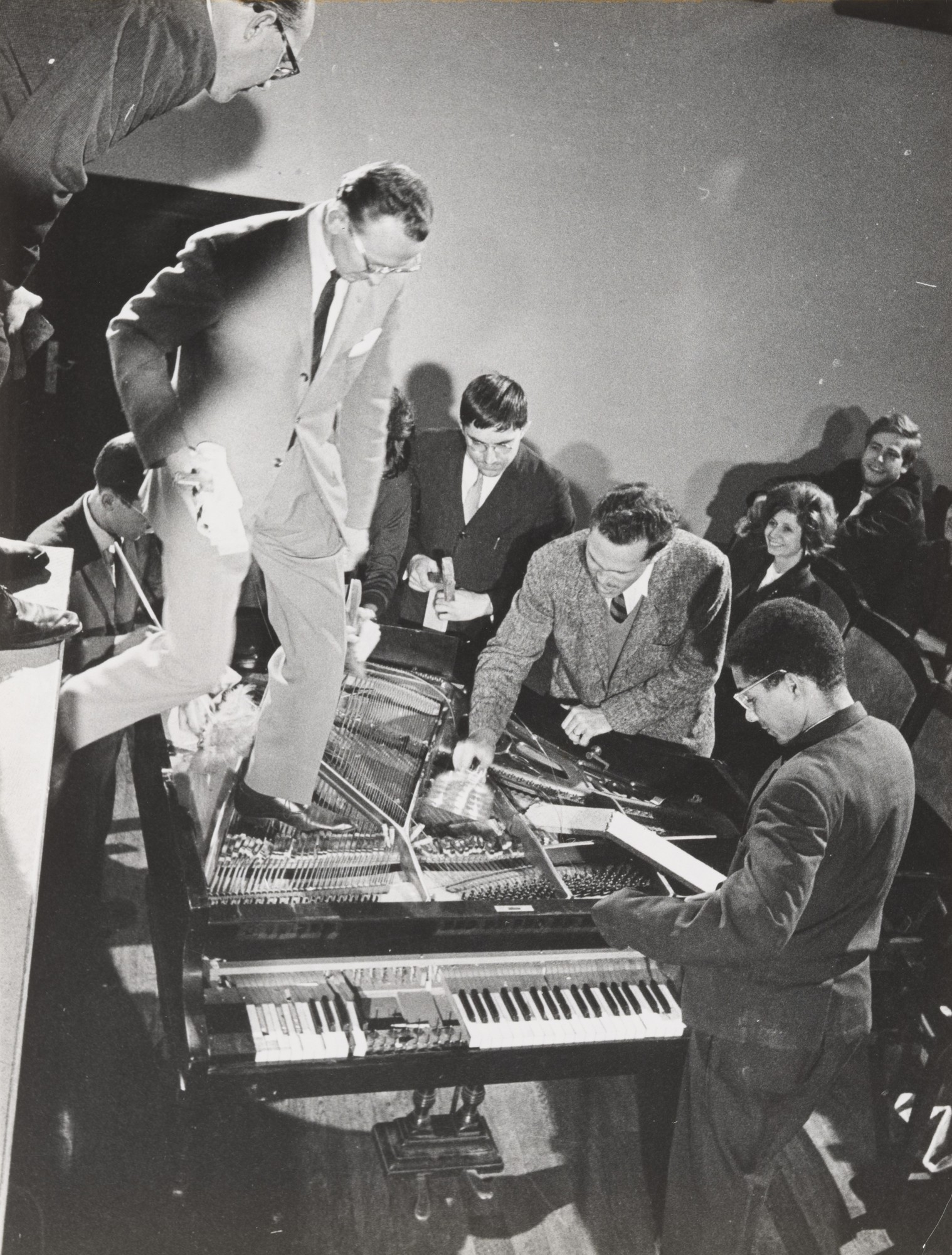 CORNER, Philip, MACIUNAS, George, WILLIAMS, Emmett, PATTERSON, Benjamin, HIGGINS,Dick, KNOWLES Alison. Piano Activities, during Fluxus Internationale Festpiele Neuester Musik, H&ouml;rsaal des St&auml;dtischen Museums, Wiesbaden, Germany, September 1, 1962