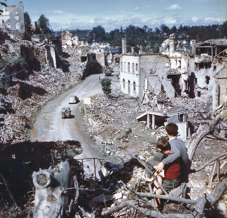 Saint Lo (France) in Ruins After Normandy Invasion: two boys overlooking the ruined remains of the village of St. Lo, France after the D-Day invasion of Normandy, June 1944