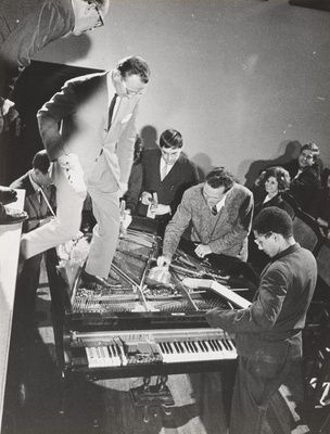 CORNER, Philip, MACIUNAS, George, WILLIAMS, Emmett, PATTERSON, Benjamin, HIGGINS,Dick, KNOWLES Alison. Piano Activities, during Fluxus Internationale Festpiele Neuester Musik, Hörsaal des Städtischen Museums, Wiesbaden, Germany, September 1, 1962