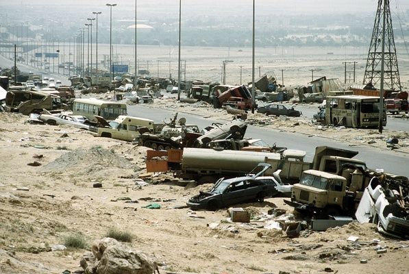 COLEMAN, Tech. Sgt. Joe. Demolished vehicles line Highway 80, also known as the "Highway of Death", the route fleeing Iraqi forces took as they retreated fom Kuwait during Operation Desert Storm, 18 Abril/April 1991